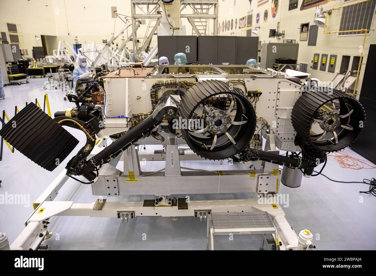 The Mars 2020 rover undergoes processing inside the Payload Hazardous Servicing Facility at NASA’s Kennedy Space Center in Florida on Feb. 14, 2020. Initial processing took place on Feb. 13, one day after a C-17 aircraft, with the rover aboard, touched down at the Launch and Landing Facility at Kennedy. The cross-country trip began at NASA’s Jet Propulsion Laboratory, where the rover was manufactured. The mission, targeted for mid-July 2020, will launch aboard an Atlas V 541 rocket from Cape Canaveral Air Force Station. NASA’s Launch Services Program based at Kennedy is managing the launch. Cl Stock Photo