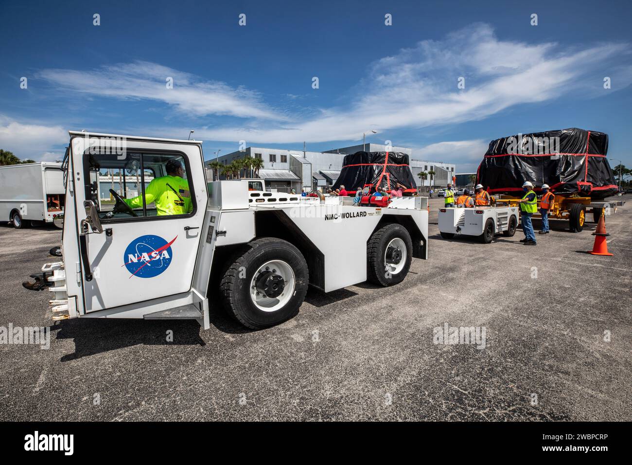 The Artemis I aft skirts for NASA's Space Launch System (SLS) rocket’s twin solid rocket boosters are transported to the Rotation Processing and Surge Facility (RPSF) at the agency’s Kennedy Space Center in Florida on June 10, 2020. The aft skirts were refurbished by Northrop Grumman. They house the thrust vector control system, which controls 70 percent of the steering during initial ascent of the SLS rocket. The segments will remain in the RPSF until ready for stacking with the forward and aft parts of the boosters on the mobile launcher in High Bay 3 of the Vehicle Assembly Building. Throug Stock Photo