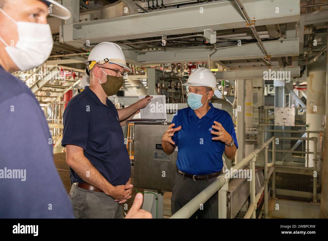 Kennedy Space Center Director Bob Cabana, far right, accompanies Russell Vought, second from right, director of the White House Office of Management and Budget, and NASA Administrator Jim Bridenstine, far left, on a tour of the Vehicle Assembly Building (VAB) on Aug. 28, 2020. The VAB is critical to the assembly of the Space Launch System rocket for NASA’s Artemis program. The Office of Management and Budget is working with the U.S. Congress to line up the necessary resources to land the first woman and the next man on the Moon in 2024. Stock Photo