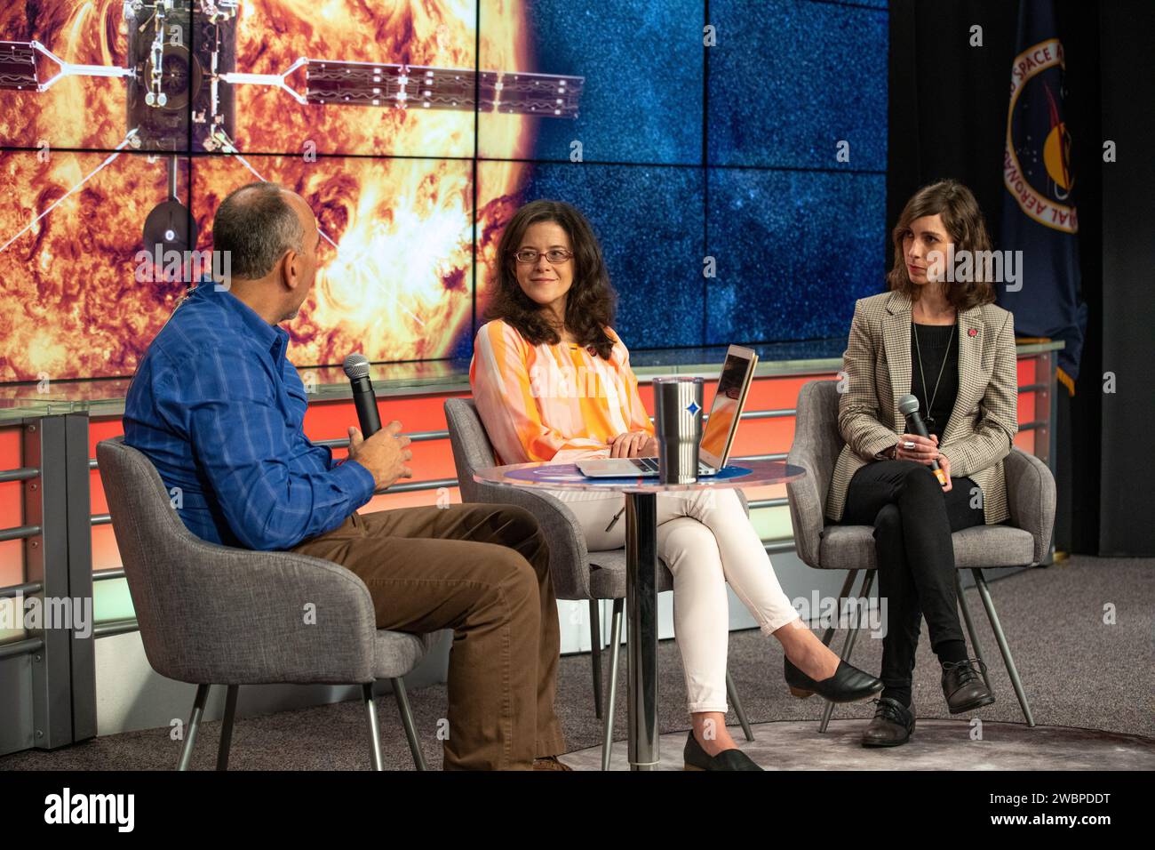 At left, Albert Sierra, Launch Services Program, moderates a Spanish Facebook Live event for the Solar Orbiter mission, with Teresa Nieves-chinchilla, deputy project scientist at NASA’s Goddard Space Flight Center in Greenbelt, Maryland, and Ana Leon, Solar Orbiter contamination control architect with Airbus Defence and Space. The event was held in the Press Site auditorium at the agency’s Kennedy Space Center in Florida on Jan. 29, 2020. Solar Orbiter is an international cooperative mission between ESA (European Space Agency) and NASA. The mission aims to study the Sun, its outer atmosphere a Stock Photo