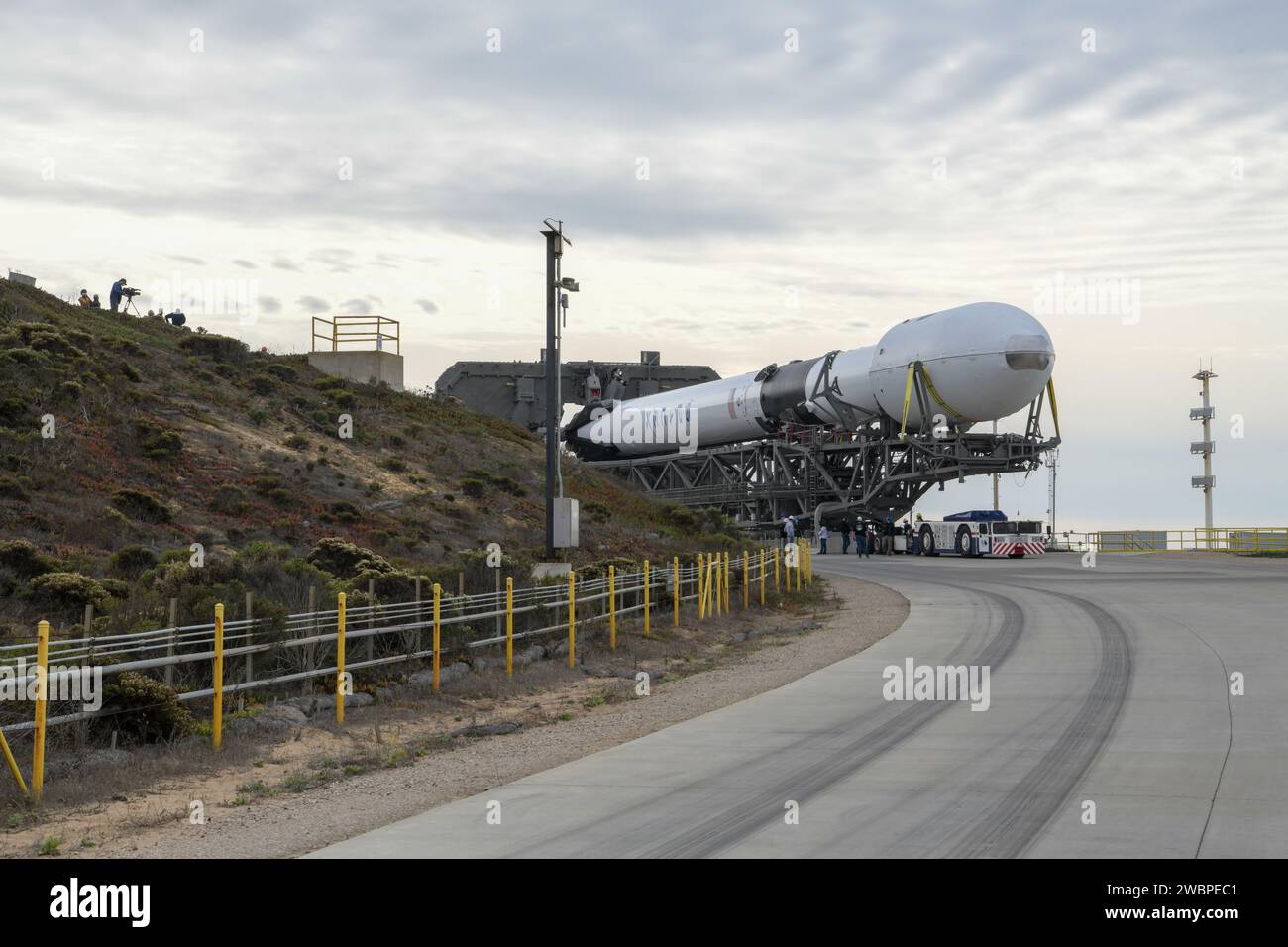 The SpaceX Falcon 9 rocket, topped with the Sentinel-6 Michael Freilich satellite secured inside its payload fairing, rolls from SpaceX’s Payload Processing Facility at Vandenberg Air Force Base in California to Space Launch Complex 4 on Nov. 20, 2020.  The Sentinel-6/Jason-CS (Continuity of Service) mission consists of the Sentinel-6 Michael Freilich satellite, which will be followed by its twin, the Sentinel-6B satellite, in 2025. The Sentinel-6/Jason-CS mission is part of Copernicus, the European Union’s Earth observation program, managed by the European Commission. Continuing the legacy of Stock Photo