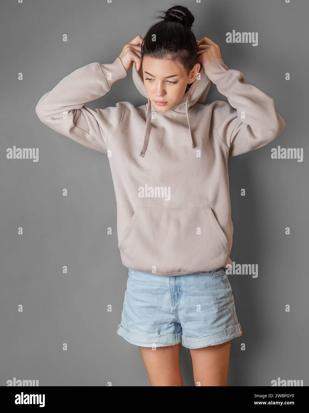 Young teenage girl wearing hoodie hi res stock photography and images Alamy