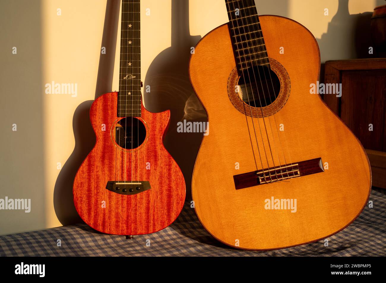 A guitar and a ukulele. Stock Photo