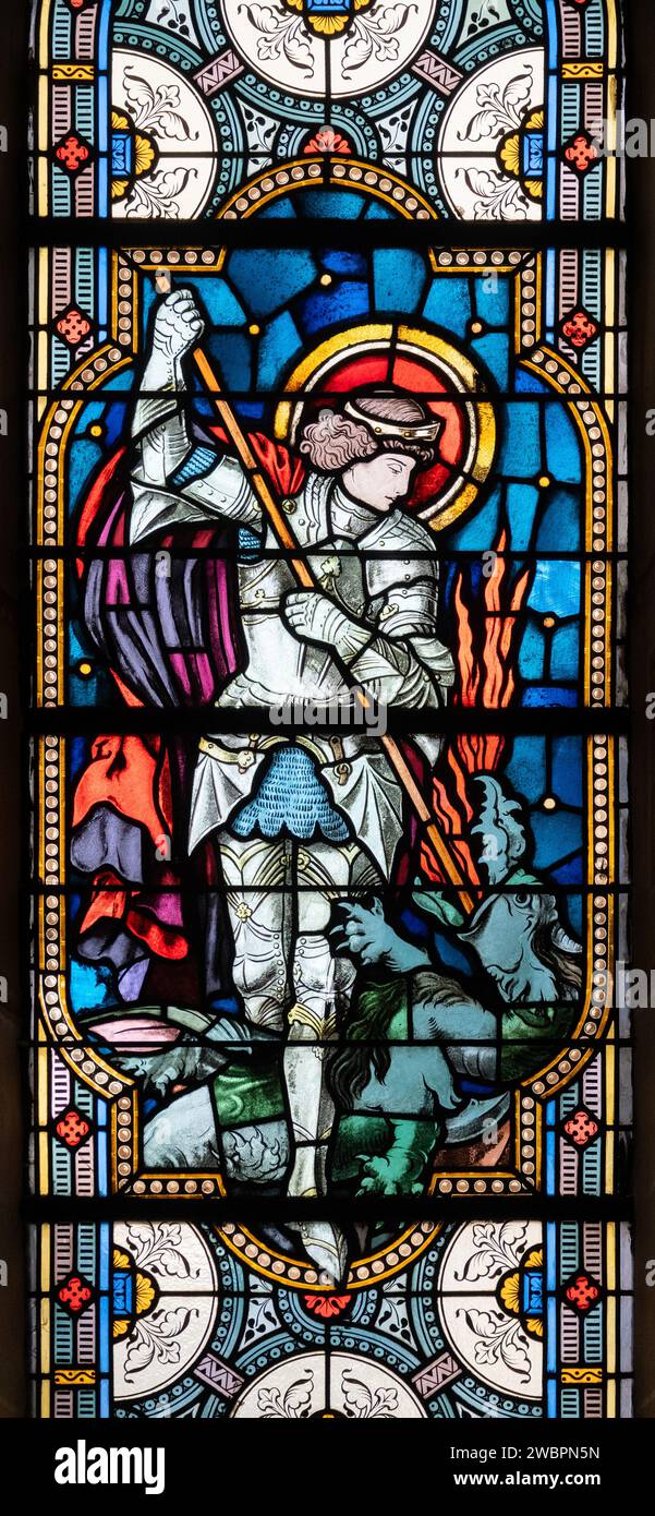 Saint Michael the Archangel. A stained-glass window in Église de la Sainte-Trinité (Holy Trinity Church) in Walferdange, Luxembourg. Stock Photo