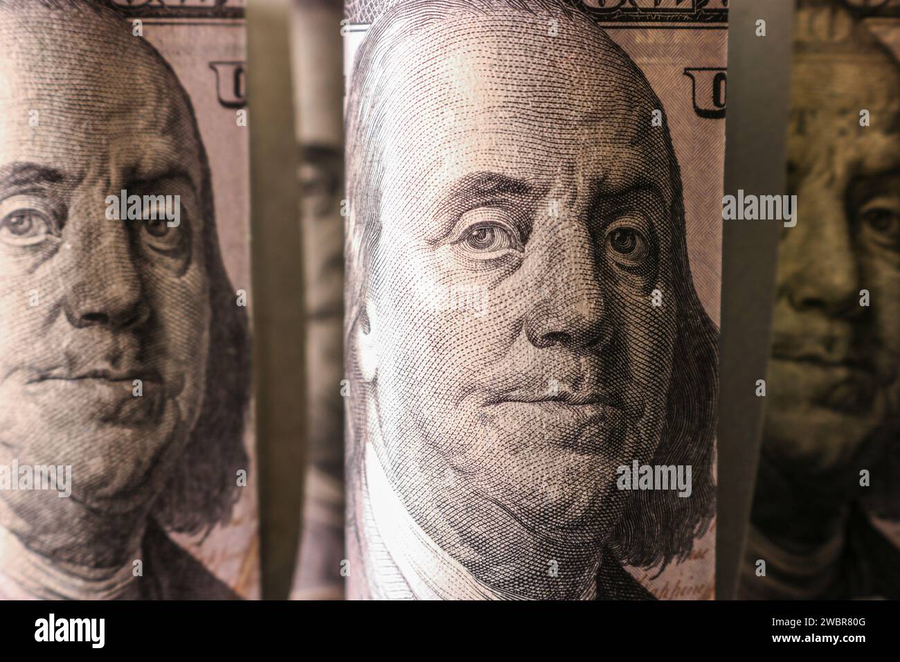 A fragment of a hundred dollar bill with a portrait of Franklin ...