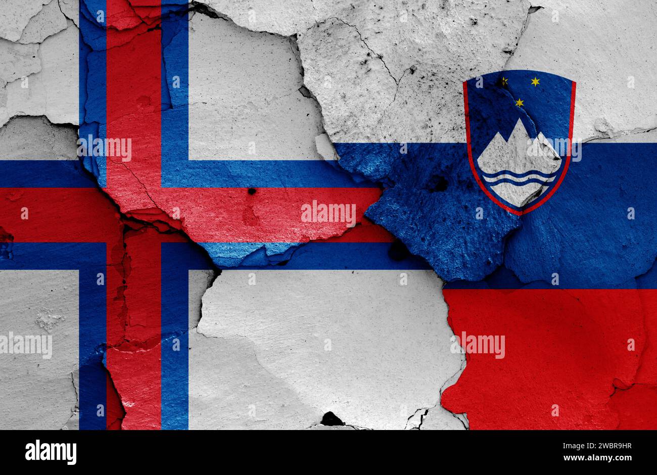flags of Faroe Islands and Slovenia painted on cracked wall Stock Photo ...