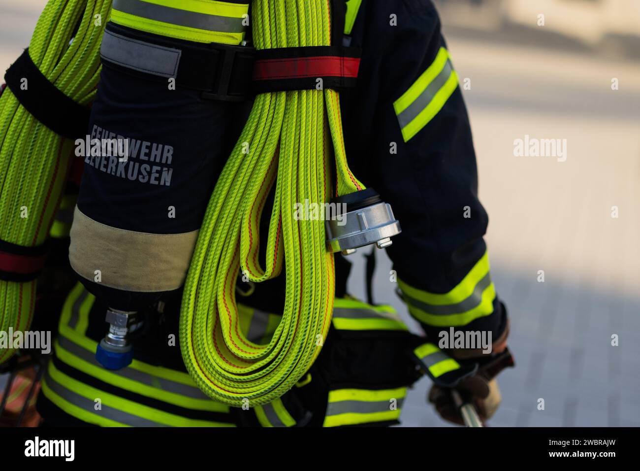 Leverkusen, Germany. 11th Jan, 2024. A firefighter in breathing ...