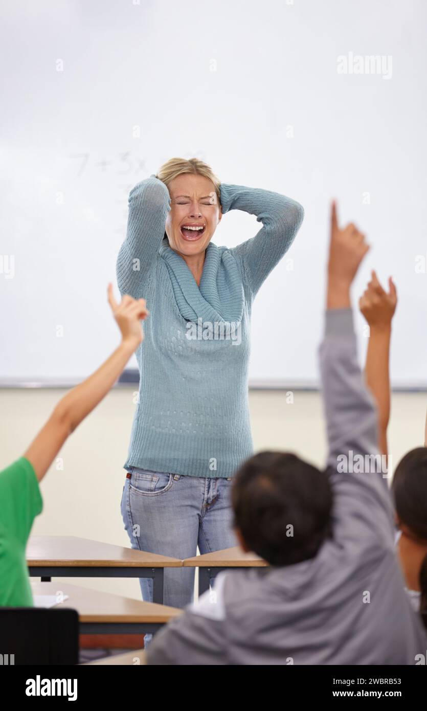 Angry teacher, classroom and shout at kids with raised hand for