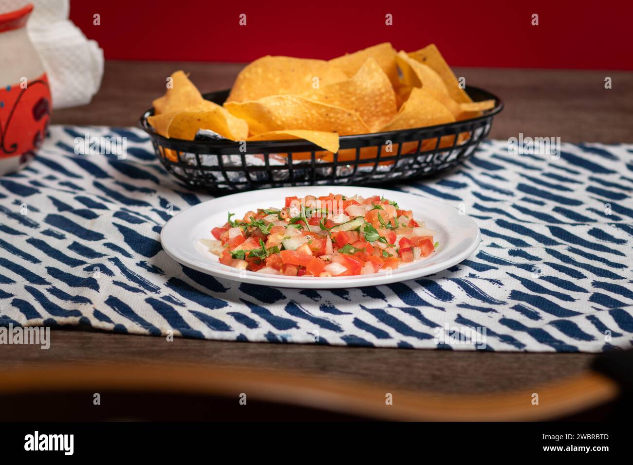 Pico de gallo dip with chips at a Mexican Restaurant Stock Photo