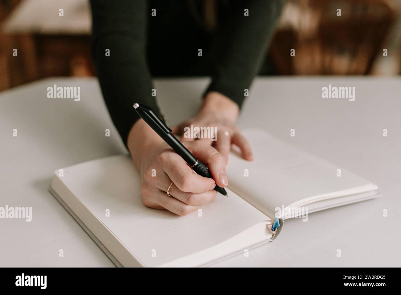 starting a fresh page in a new notebook for goal setting Stock Photo