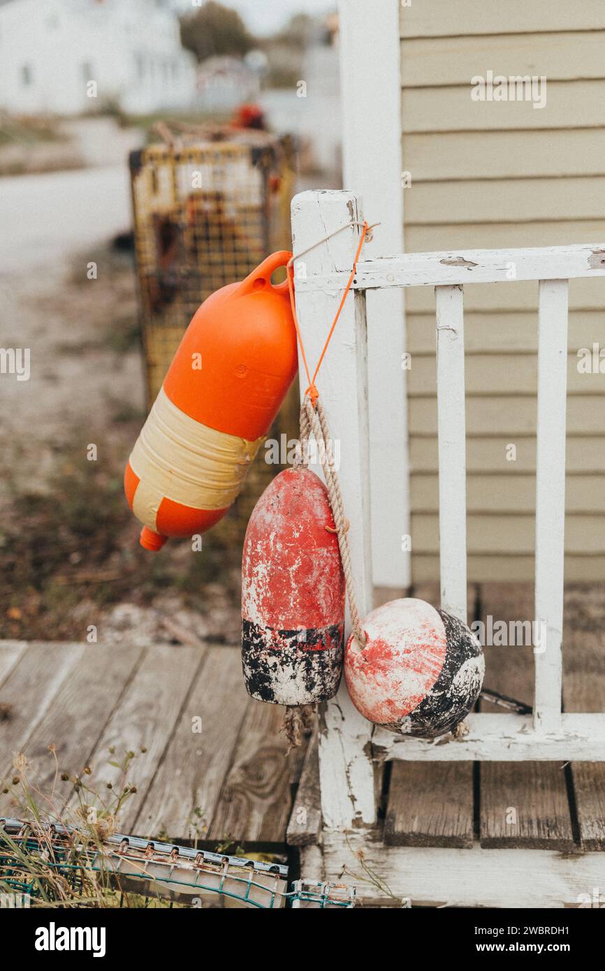 Lobstering Buoys Hanging outside a Building in Maine Stock Photo
