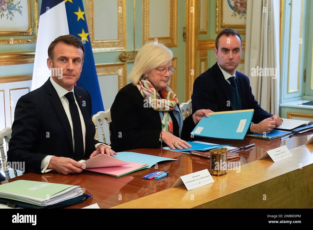 French President Emmanuel Macron, left, newly appointed French Minister