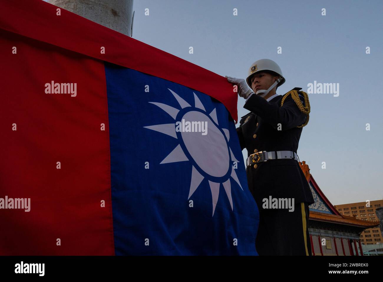 A honor guard takes part in a flag lowering ceremony at Chiang Kai Shek ...