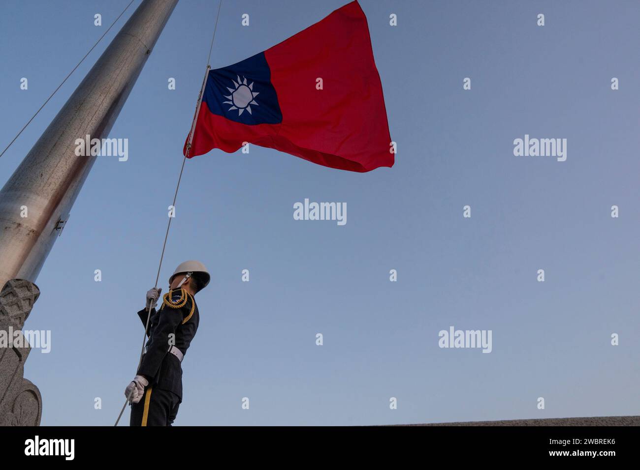 A honor guard takes part in a flag lowering ceremony at Chiang Kai Shek ...
