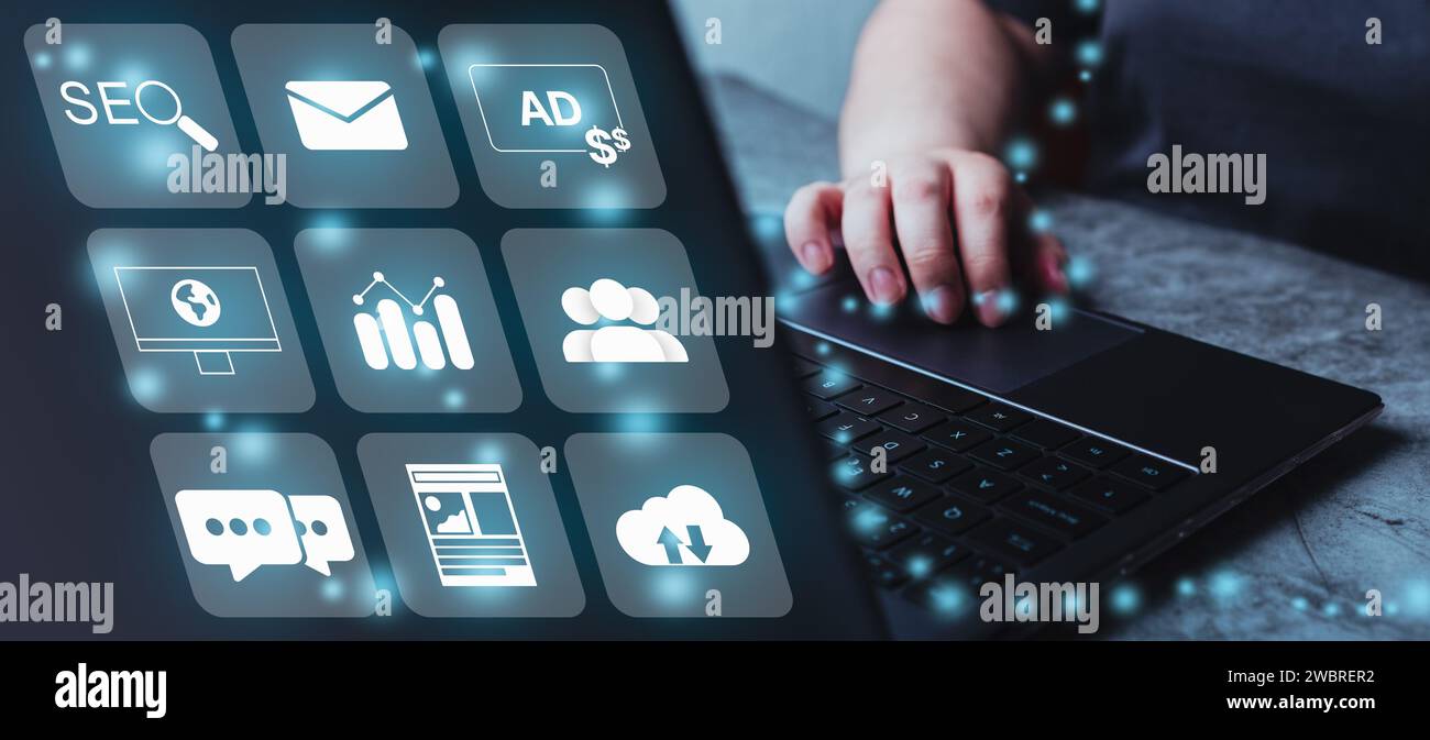 Woman use laptop with digital online marketing technology concept interface. Search Engine Optimisation. SEO. SMM. Customer network connection. Stock Photo