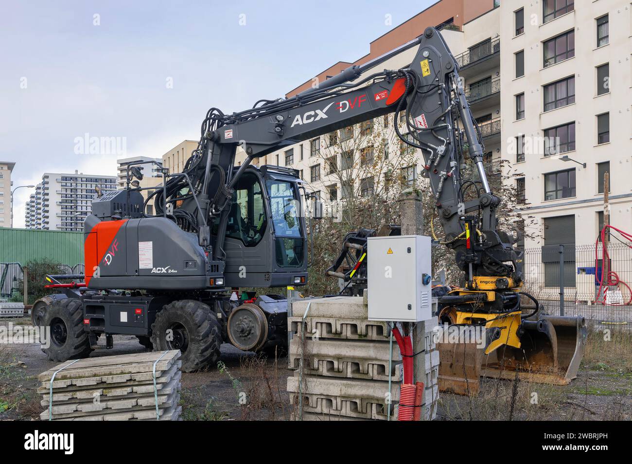 Nancy, France - Dark grey road-rail wheeled excavator ACX 24RR on construction site. Stock Photo