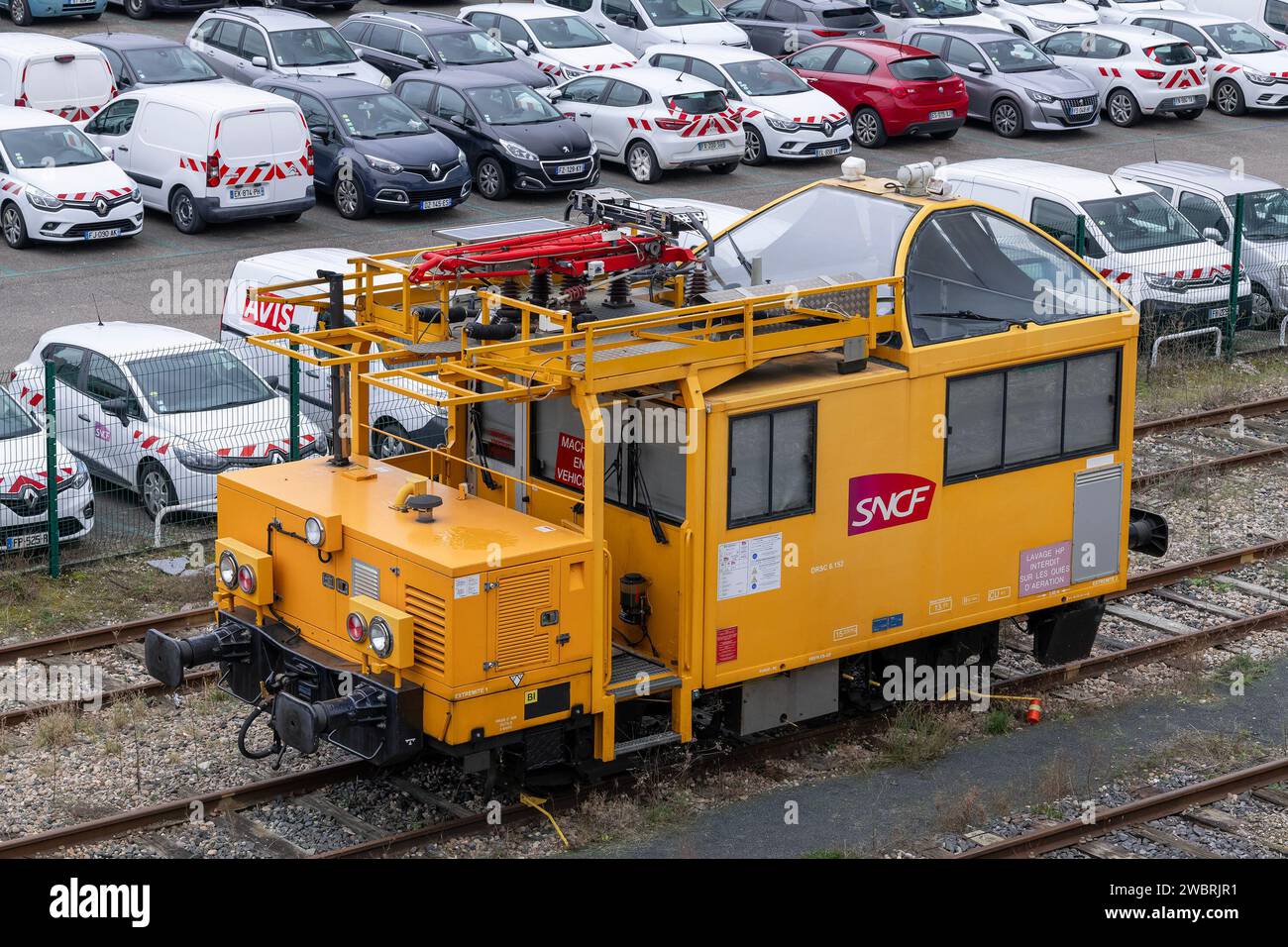 Nancy, France - Yellow thermal draisine DU 65 DRSC 6.152 used for catenary monitoring at the railway depot at Nancy station. Stock Photo