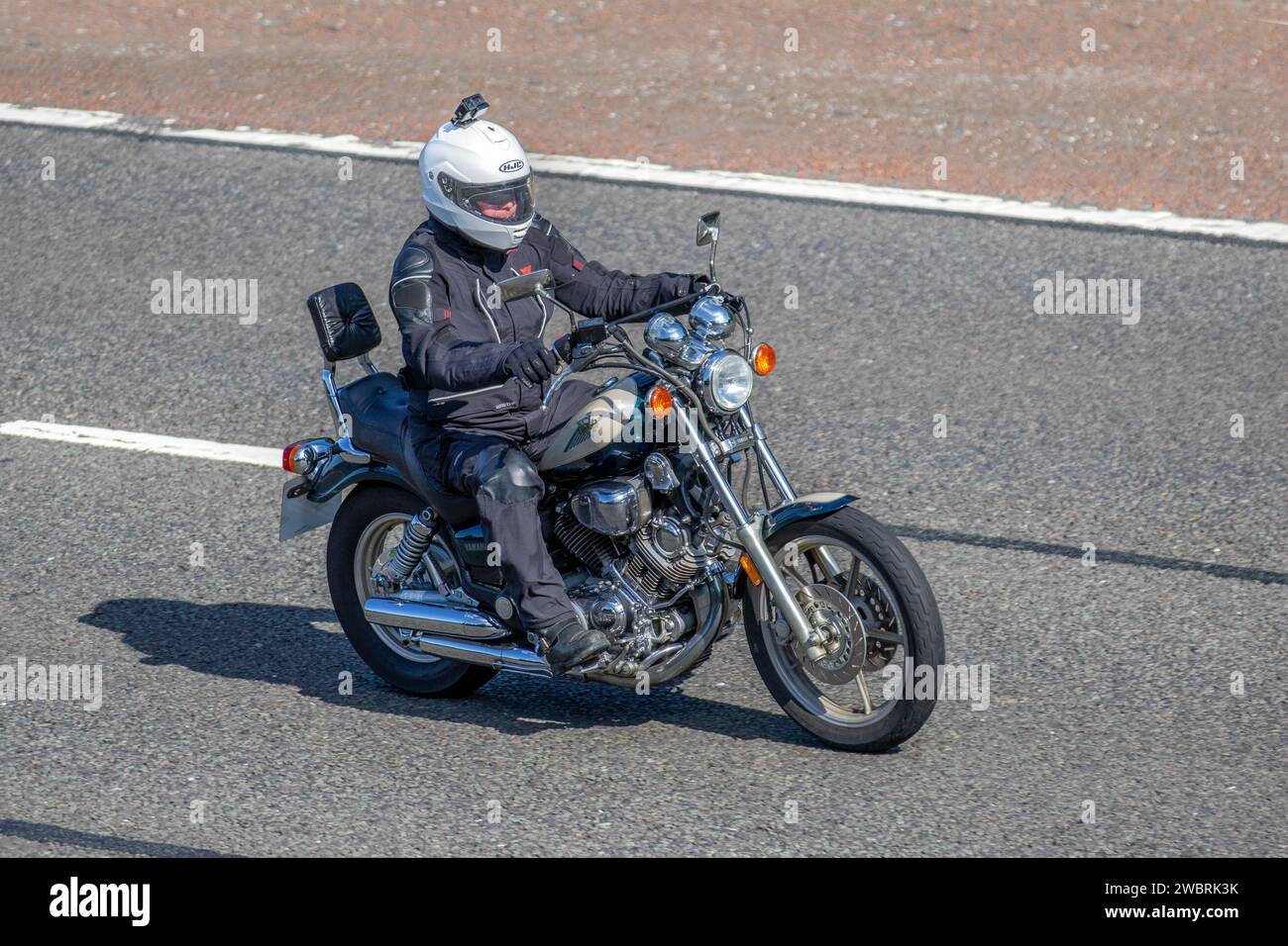 YAMAHA Virago V-Twin cruiser motorcycle; travelling at speed on the M6 motorway in Greater Manchester, UK Stock Photo