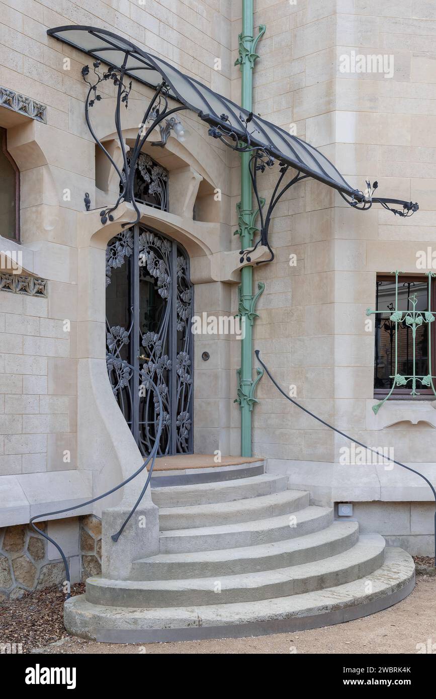 Nancy, France - Focus on the entrance on the Art Nouveau Villa Jika build in 1902 with its numerous decorative ironworks with plant motifs. Stock Photo