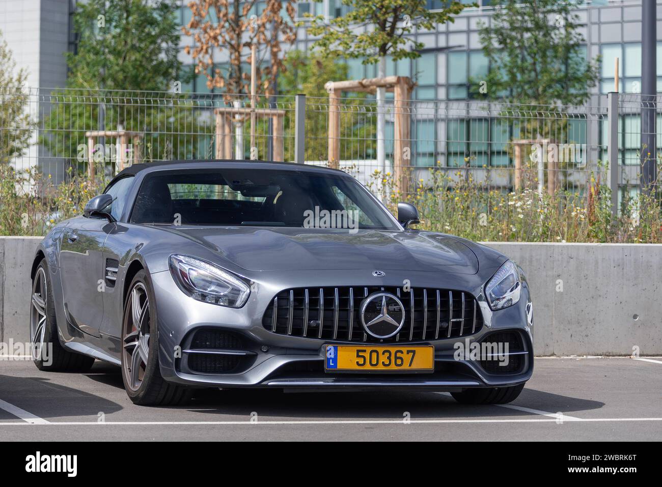 Luxembourg City, Luxembourg - Grey Mercedes-AMG GT C Roadster parked on the street. Stock Photo