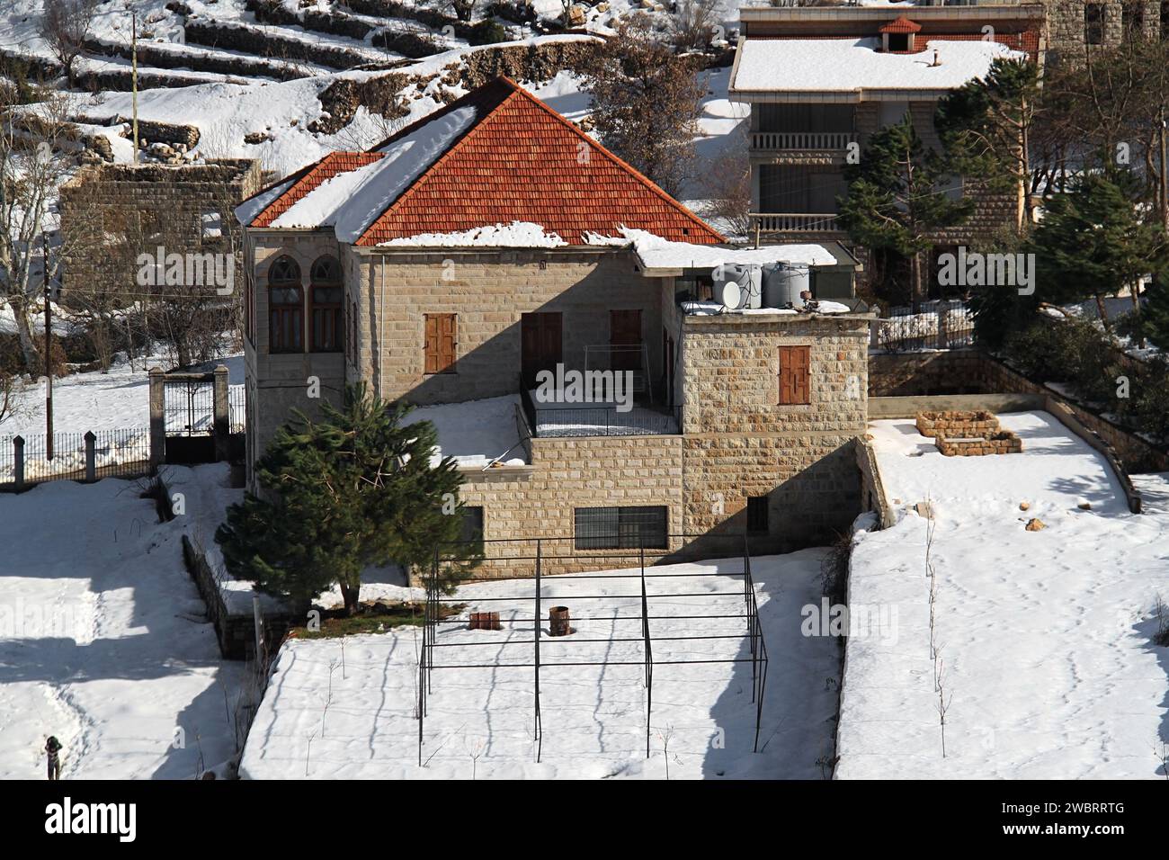 A traditional Lebanese house wih its garden under snow Stock Photo Alamy