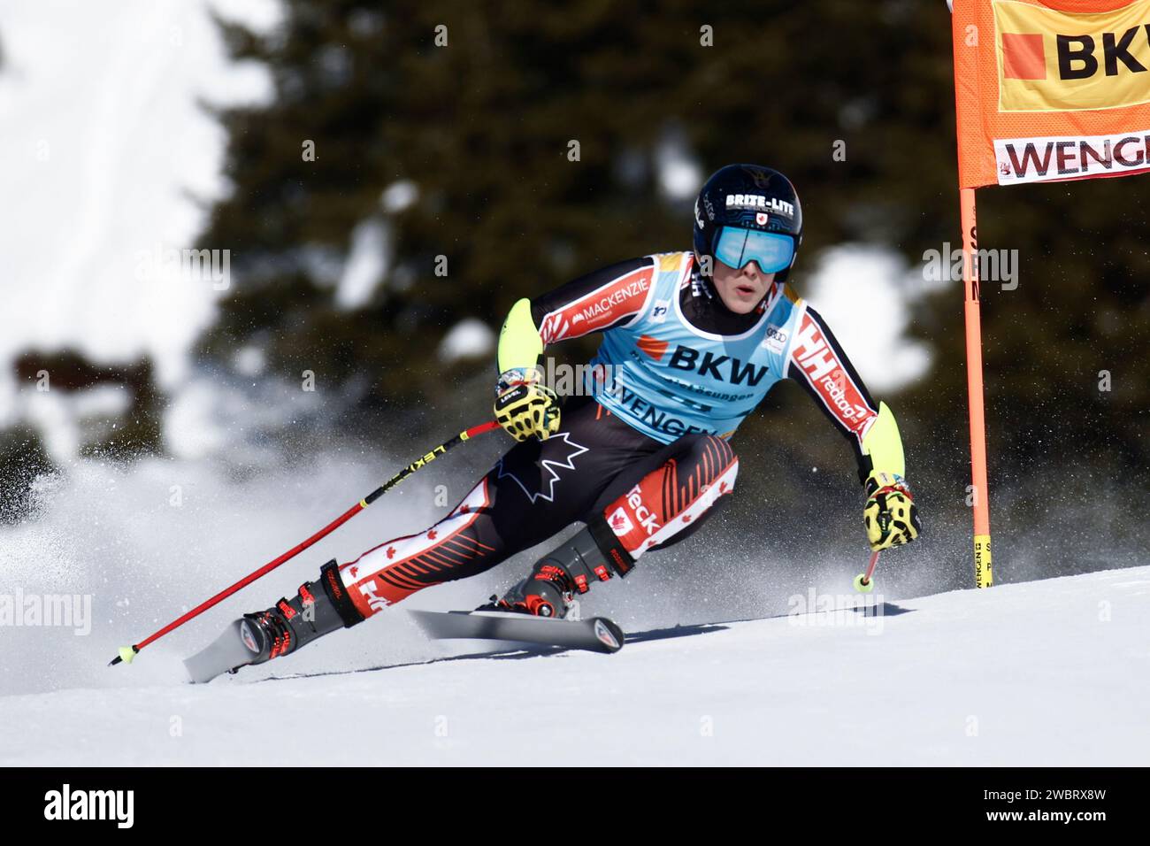 Canada's Riley Seger speeds down the course during an alpine ski, men's