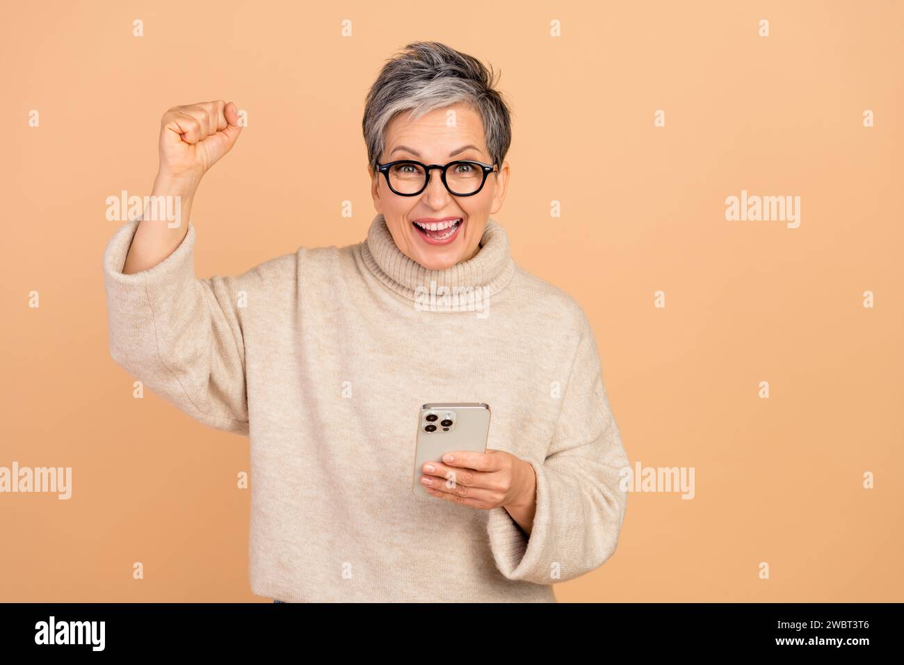 Mature woman fist up isolated hi-res stock photography and images - Alamy