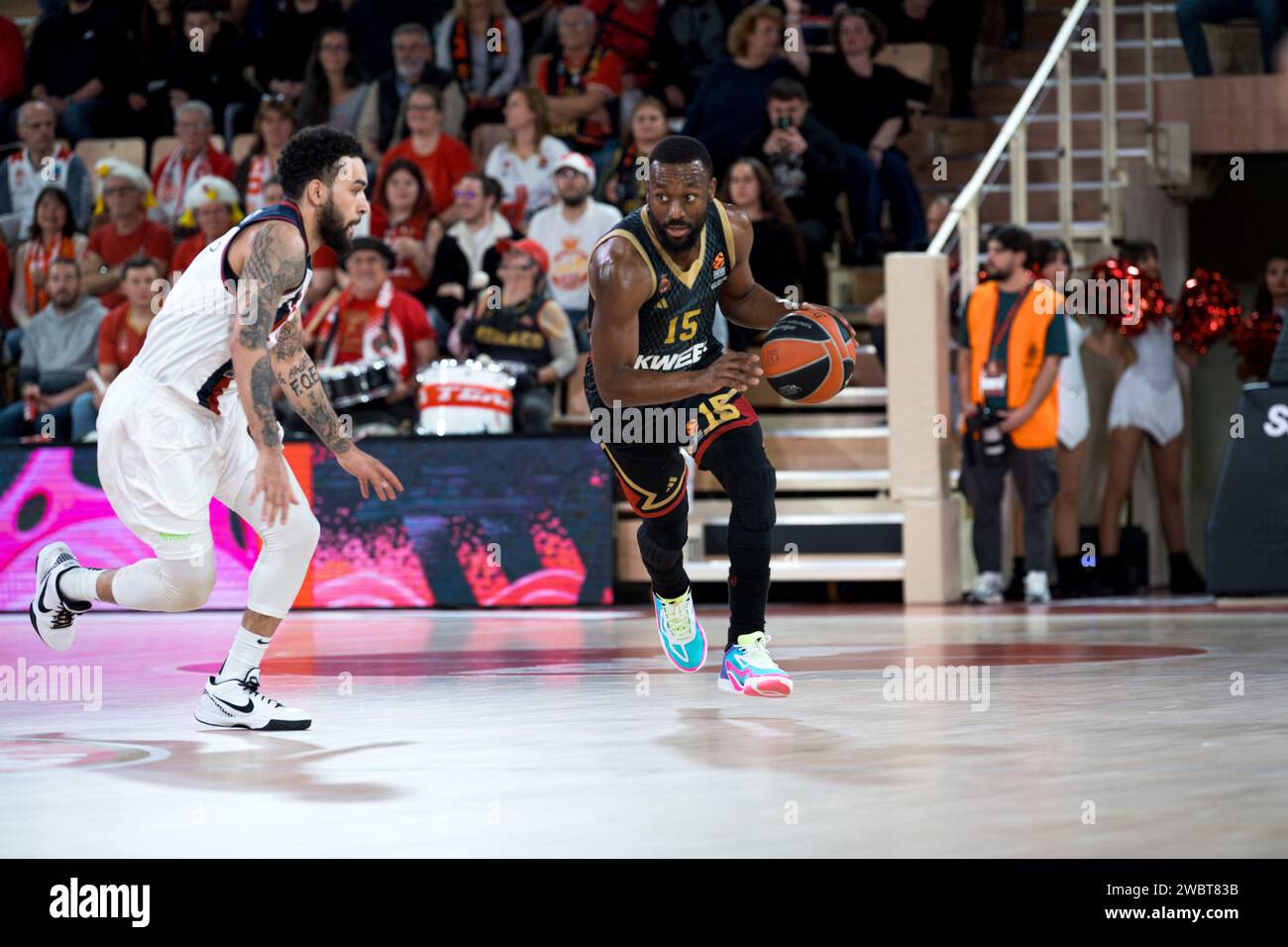 Monaco player #15 Kemba Walker and Baskonia player #3 Chris Chiozza are ...