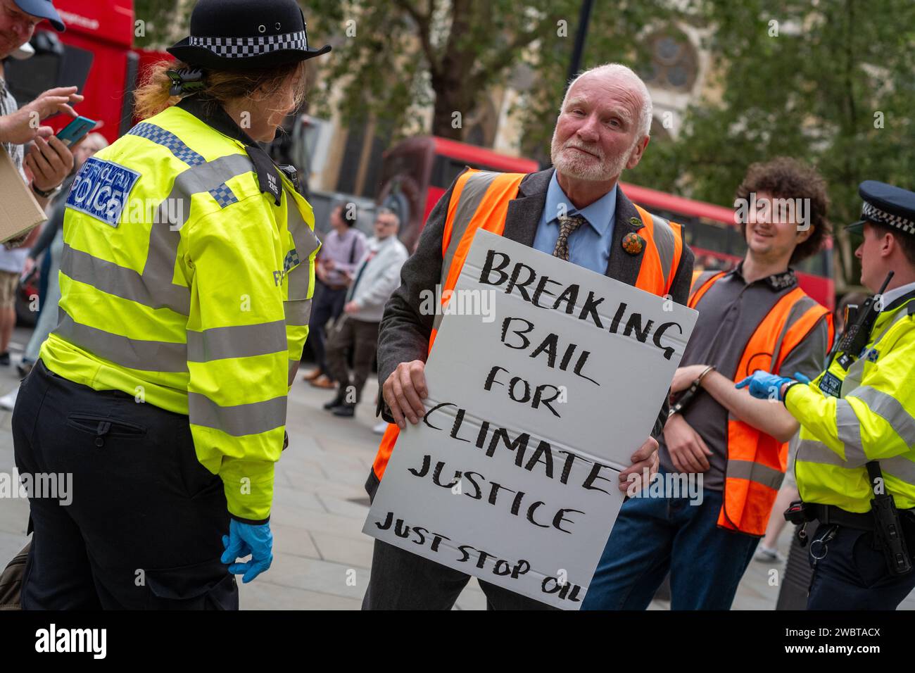 London, United Kingdom, July 19 2023: Just Stop Oil activist arrested by Met Police after a slow march Stock Photo
