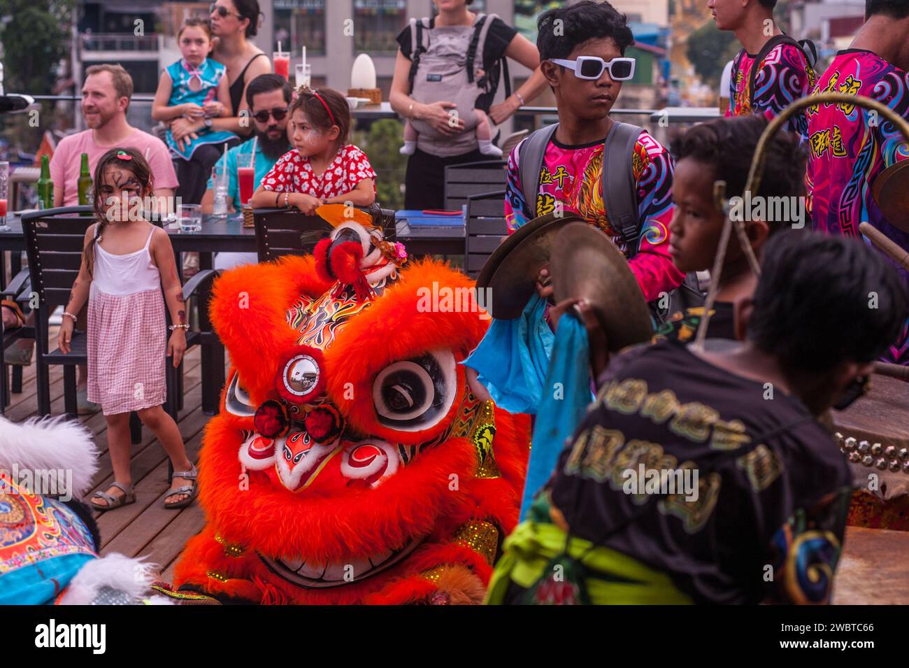 Lion dancing at a skybar for Chinese New Year, "Year of the Rabbit