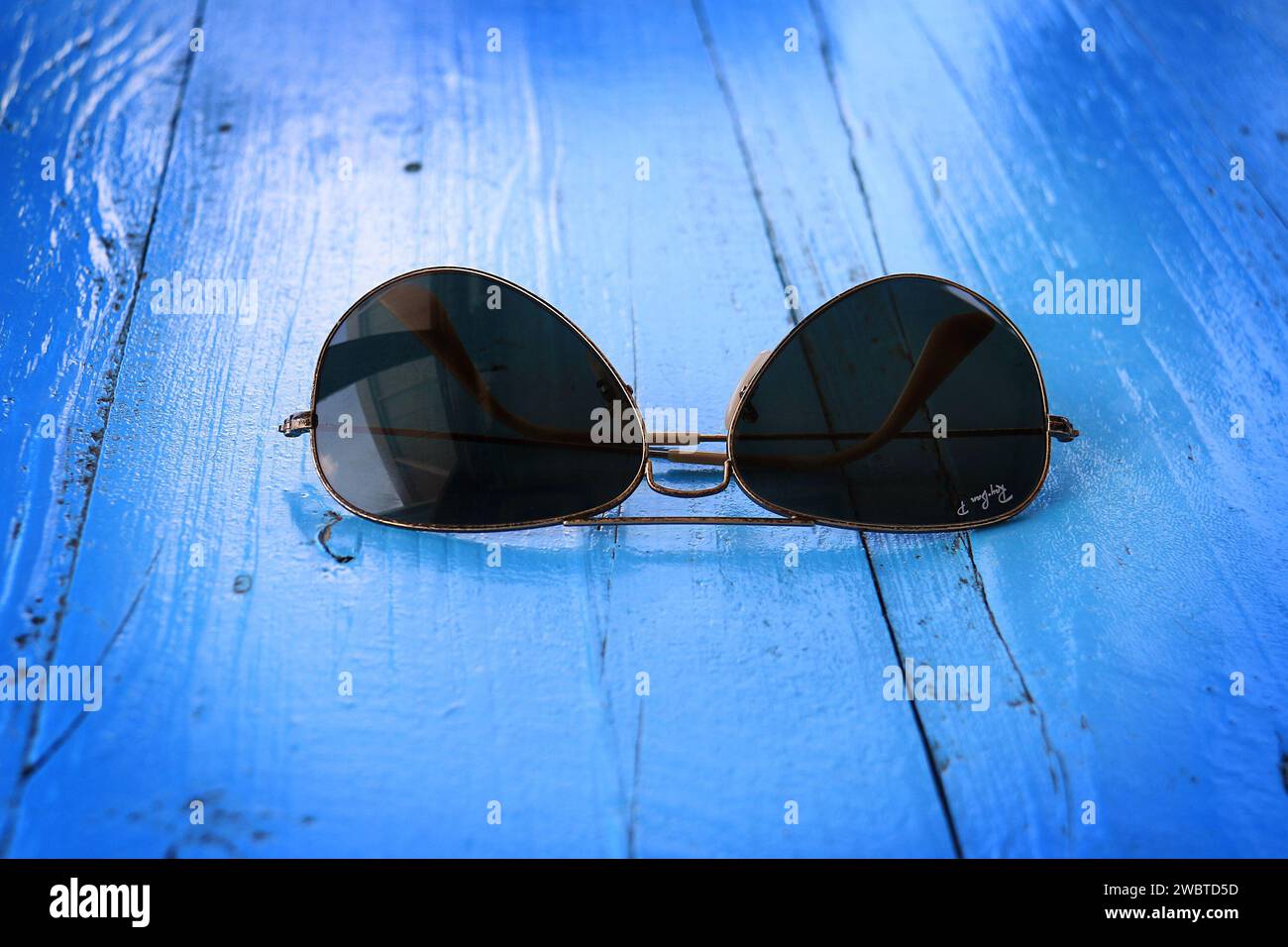 BATROUN, LEBANON - JULY 22, 2018: The Ray-Ban Aviator sunglasses with polarized Lenses. Ray-Ban is founded in 1937 by American company Bausch & Lomb. Stock Photo