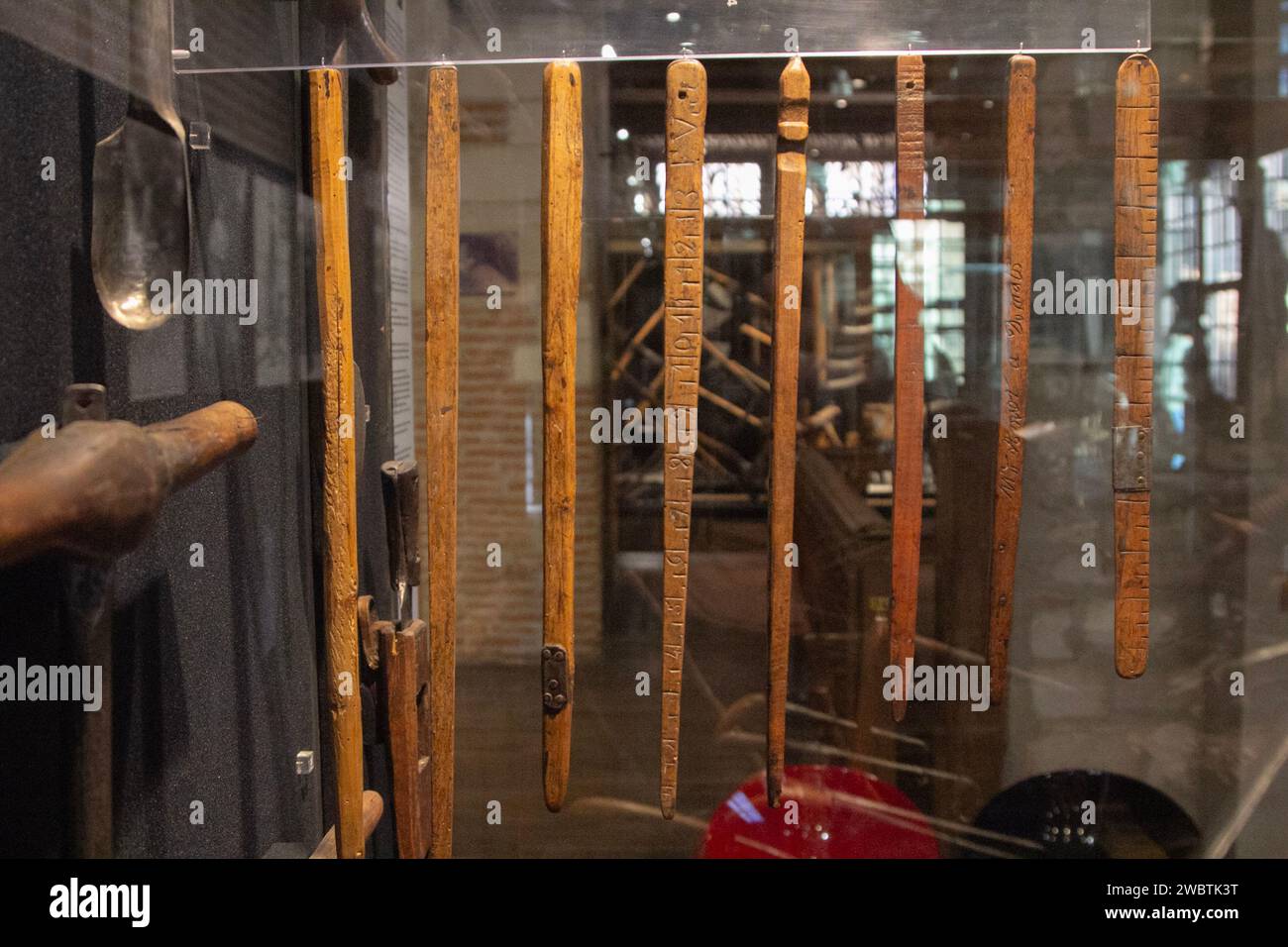 Antique wooden clogmakers' gauges on display at the Maison de l'Outil (tool museum) in Troyes, France. Stock Photo