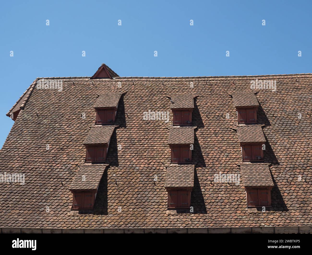 Ancient Dormer Windows In A High Roof Stock Photo - Alamy