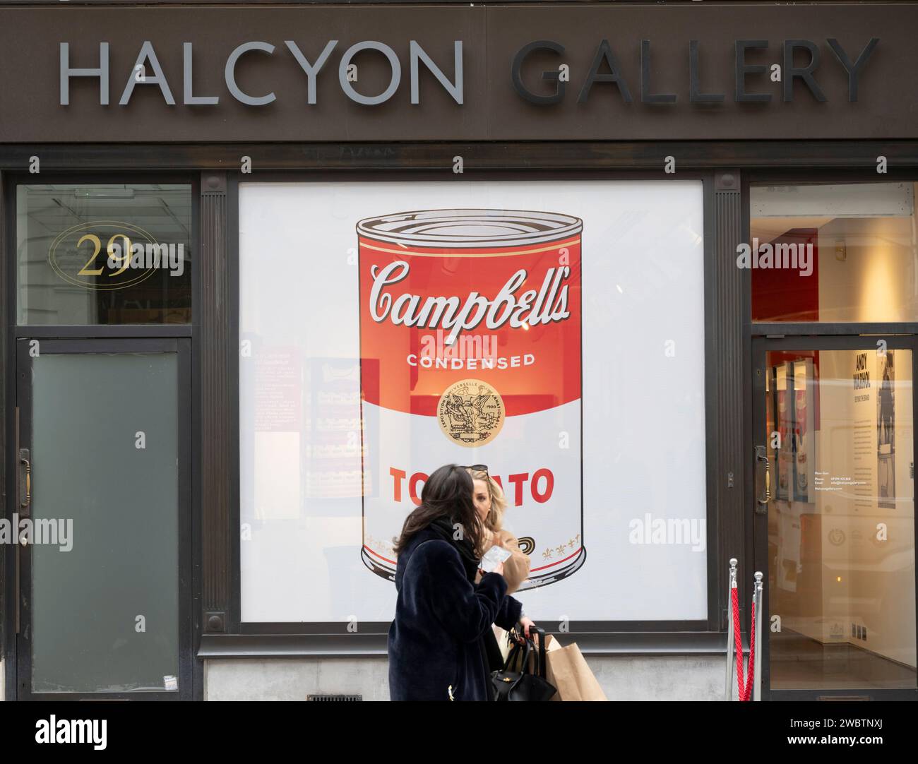 New Bond Street, London, UK. 12th Jan, 2024. Post-Christmas grey winter day in London‘s fashionable New Bond Street with colourful Andy Warhol Campbells Tomato Soup window display at Halcyon Gallery. Credit: Malcolm Park/Alamy Live News Stock Photo