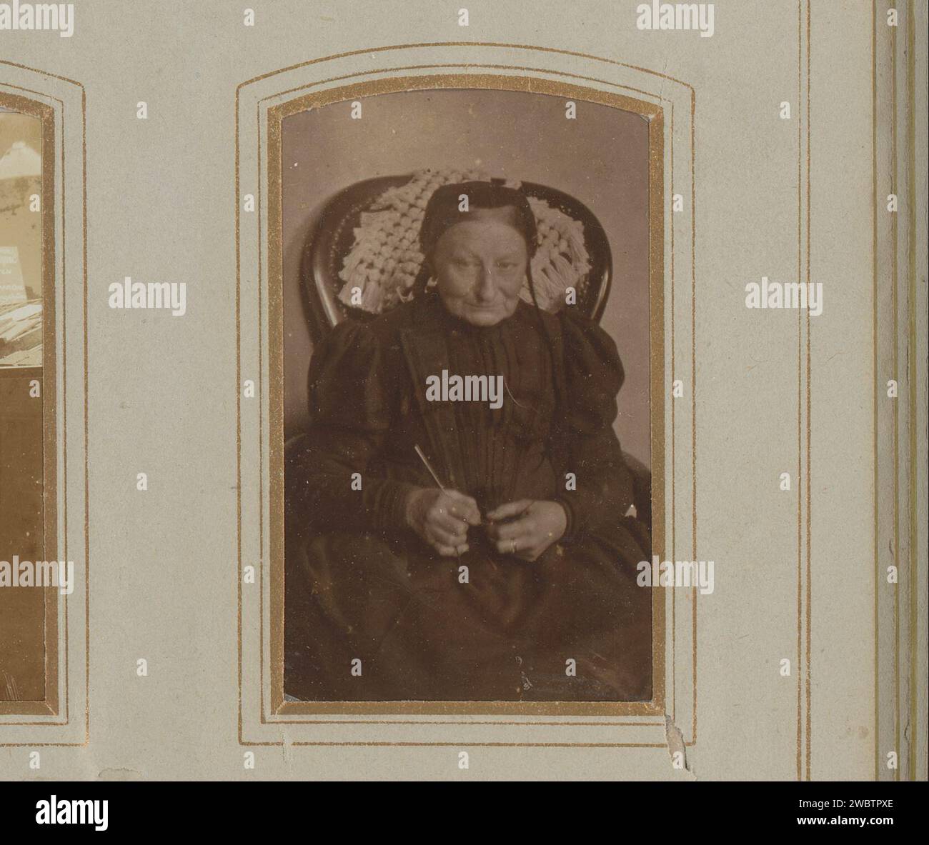 Old woman sitting in a chair hi-res stock photography and images - Alamy