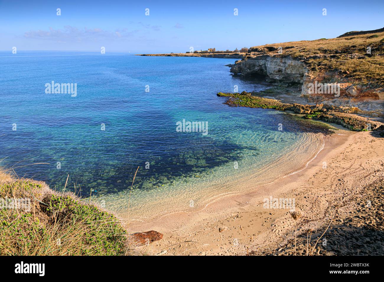 The most beautiful Apulian coast in Italy: Cala Corvino Beach. Typical coastline near Monopoli : high and rocky coast characterized by small sandy cov Stock Photo