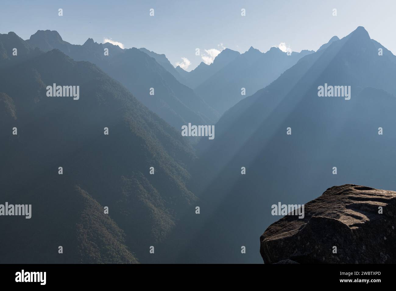 A view from the Machu Picchu citadel ruins of the Sacred Valley mountains in Peru Stock Photo