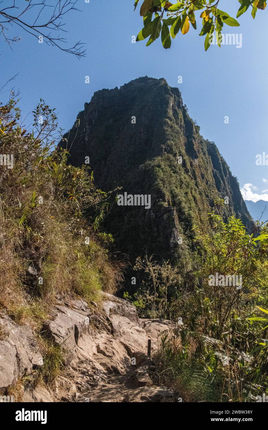 A view of Huayna Picchu mountain from the Machu Picchu citadel ruins in the Sacred Valley in Peru Stock Photo