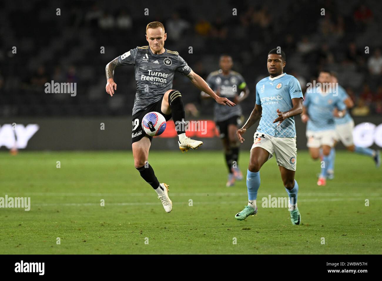 12th January 2024;  CommBank  Stadium, Sydney, NSW, Australia: A-League Football, Melbourne City versus Western Sydney Wanderers; Jack Clisby of Western Sydney Wanderers controls the ball ahead of Leo Natel of Melbourne City Stock Photo