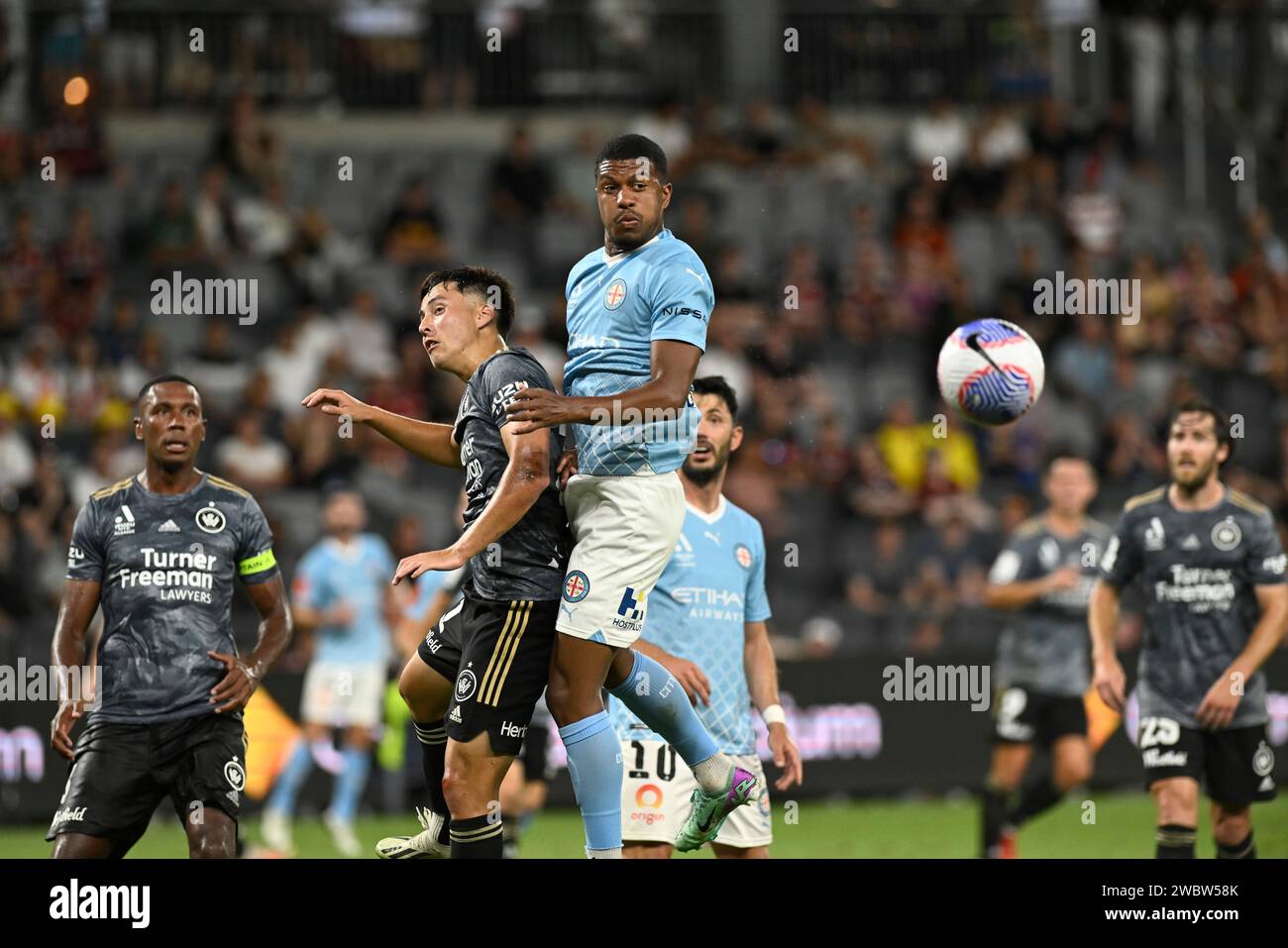 12th January 2024; CommBank Stadium, Sydney, NSW, Australia: A-League Football, Melbourne City versus Western Sydney Wanderers; Leo Natel of Melbourne City competes with Aidan Simmons of Western Sydney Wanderers for the corner kick Stock Photo