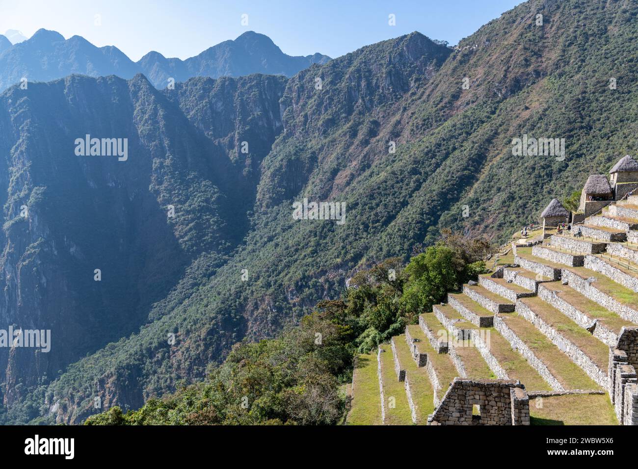 A view of the Machu Picchu citadel ruins and the mountains of the Sacred Valley in Peru Stock Photo