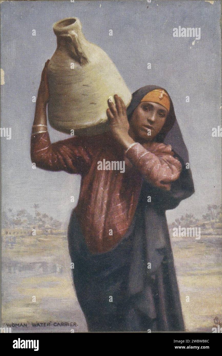 Woman carrying water jug on hi-res stock photography and images