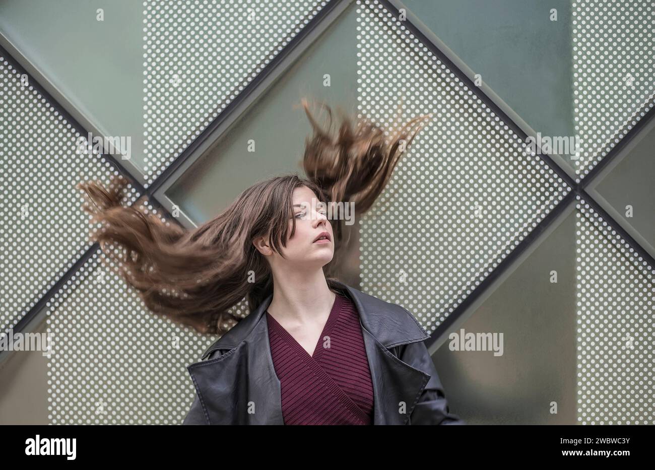 selbstbewusste junge Frau mit wehenden Haaren *** self-confident young woman with flowing hair Stock Photo