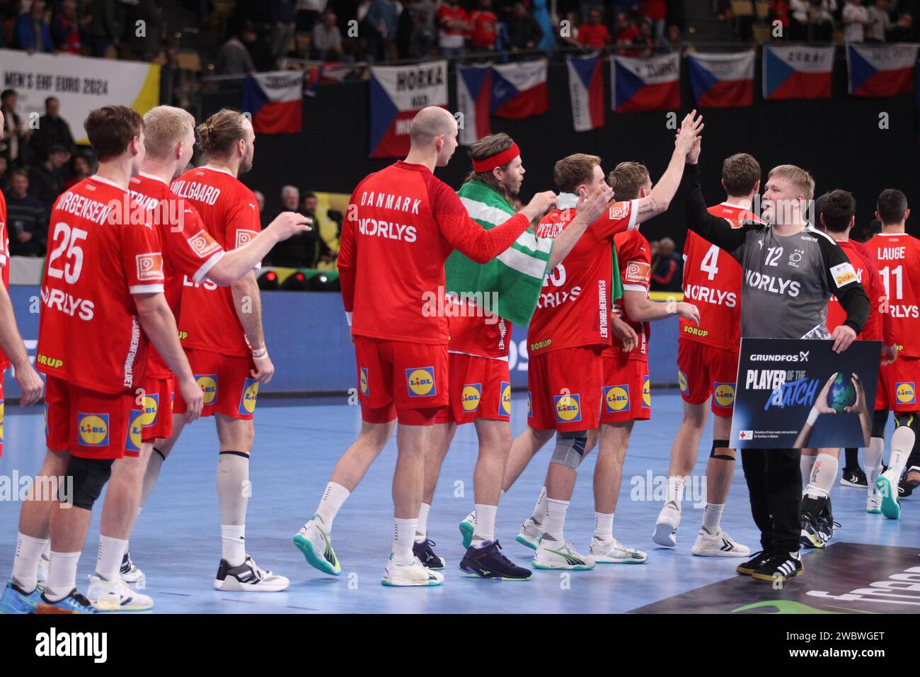 MUNICH, Germany. , . Danish players celebrate with 12 KEEPER eMIL