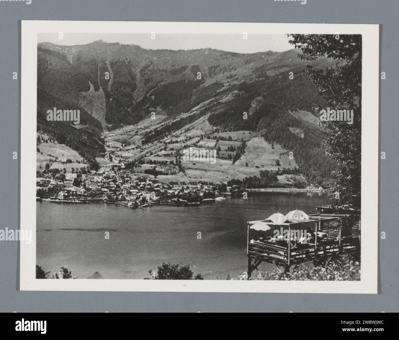 View of Zell am See, the Zeller See and the Schmittenhöhe, Anonymous, C.J.S., c. 1950 - c. 1960 photograph  Zell am Seepublisher: Salzburg photographic support gelatin silver print city-view, and landscape with man-made constructions. mountains. lake Zell am See Stock Photo