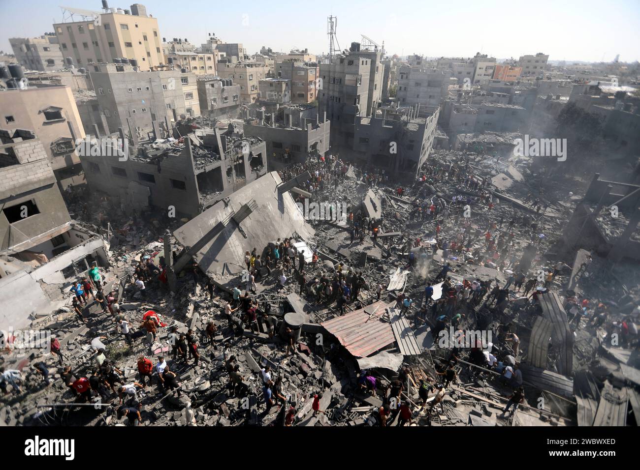 Palestinians Inspect The Rubble Of Destroyed Buildings Following 