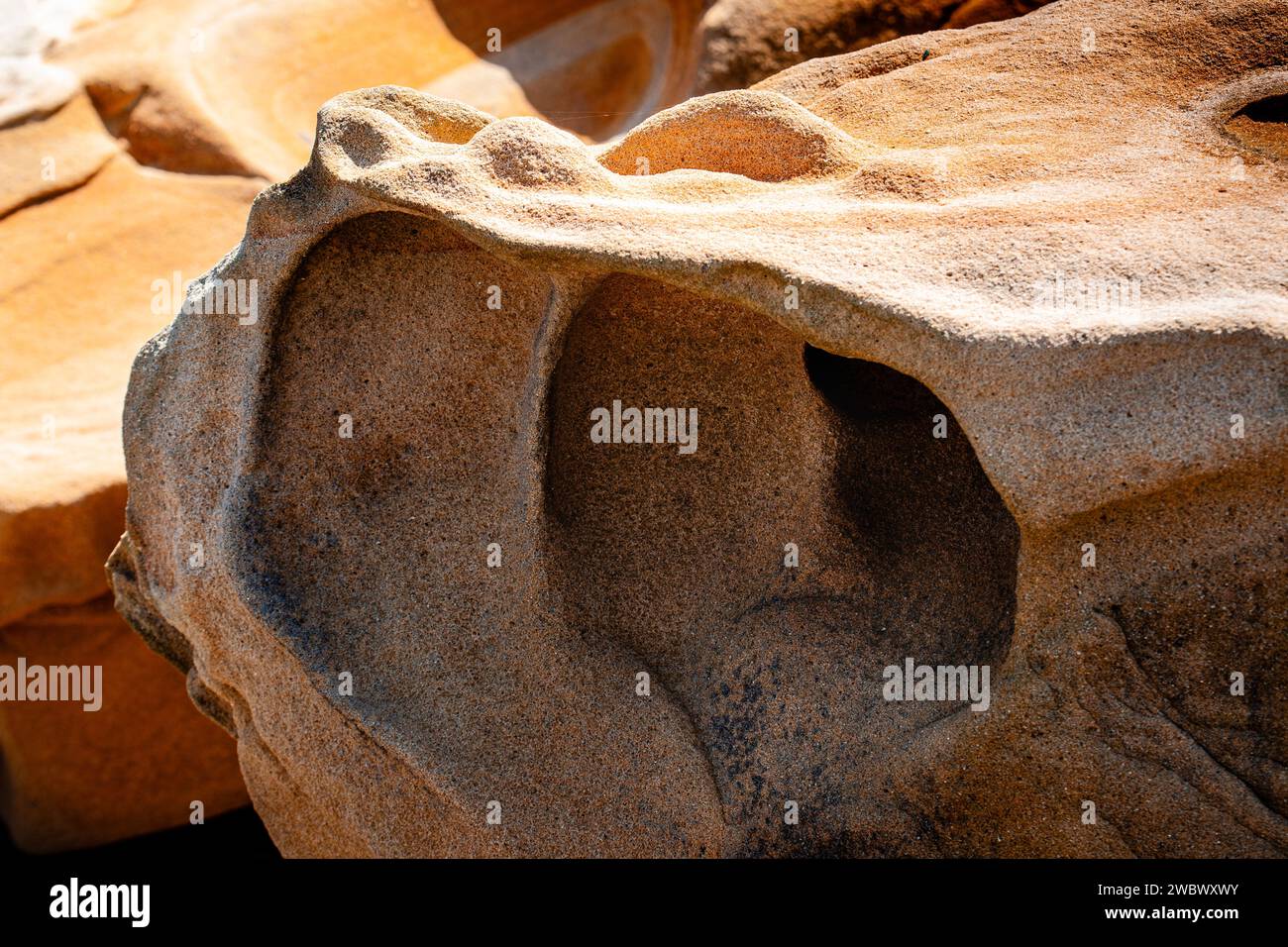 Picture of a big rock with abstract shapes in the cliffs of Jaizkibel Stock Photo