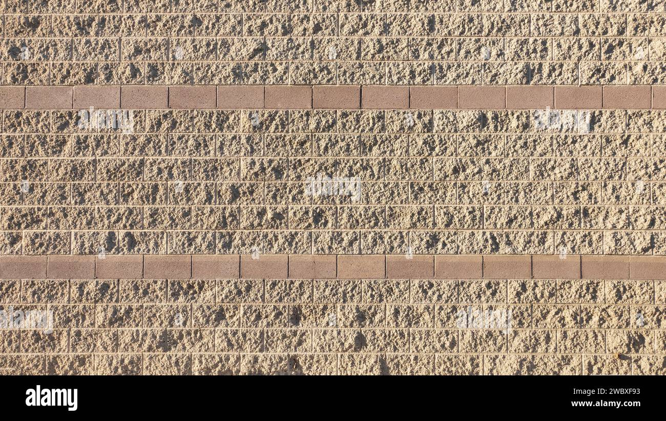 Wide angle view of a textured cinder block wall. Suitable for ...