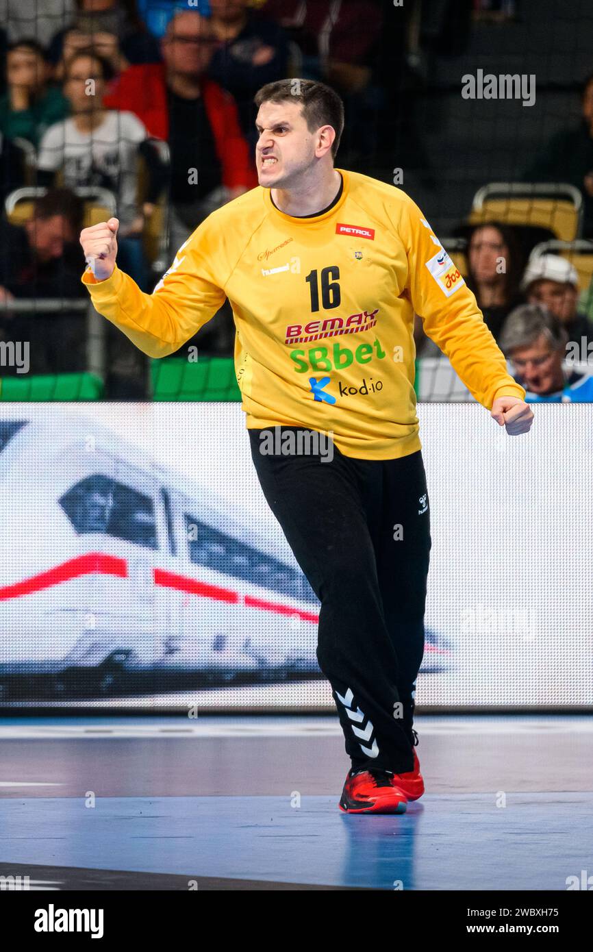 Munich, Germany. 12th Jan, 2024. Handball: European Championship, Hungary - Montenegro, preliminary round, Group C, match day 1. Montenegro's goalkeeper Nebojsa Simic celebrates. Credit: Marco Wolf/dpa/Alamy Live News Stock Photo