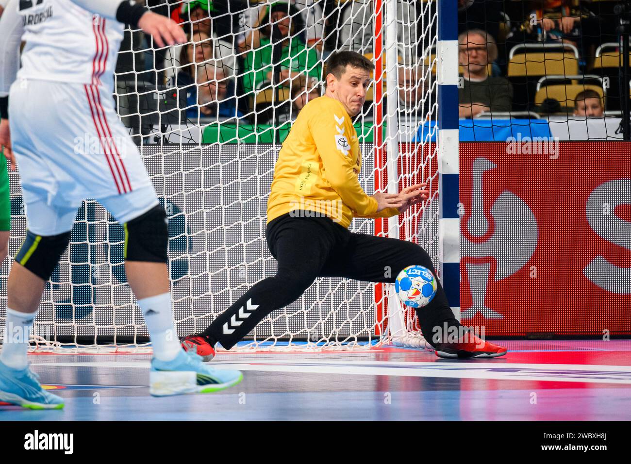 Munich, Germany. 12th Jan, 2024. Handball: European Championship, Hungary - Montenegro, preliminary round, group C, match day 1. Montenegro's goalkeeper Nebojsa Simic in action. Credit: Marco Wolf/dpa/Alamy Live News Stock Photo